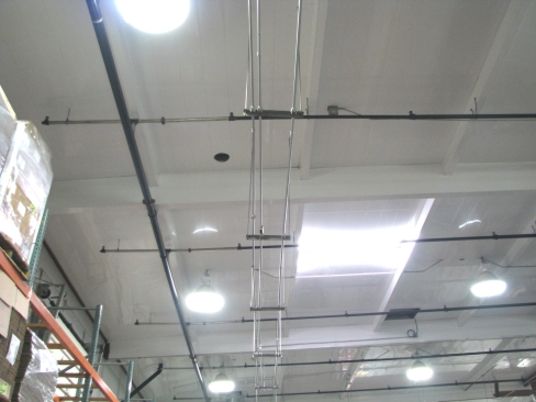 Extrutech Panels mounted to the ceiling of a process plant