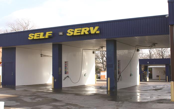 Glossy White PVC Wall and Ceiling Panels from Extrutech Plastics Inc. (EPI) used in a Car Wash