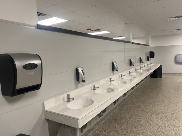 Extrutech-EPI Glossy Gary PVC Wall Panels used in a Public Restroom